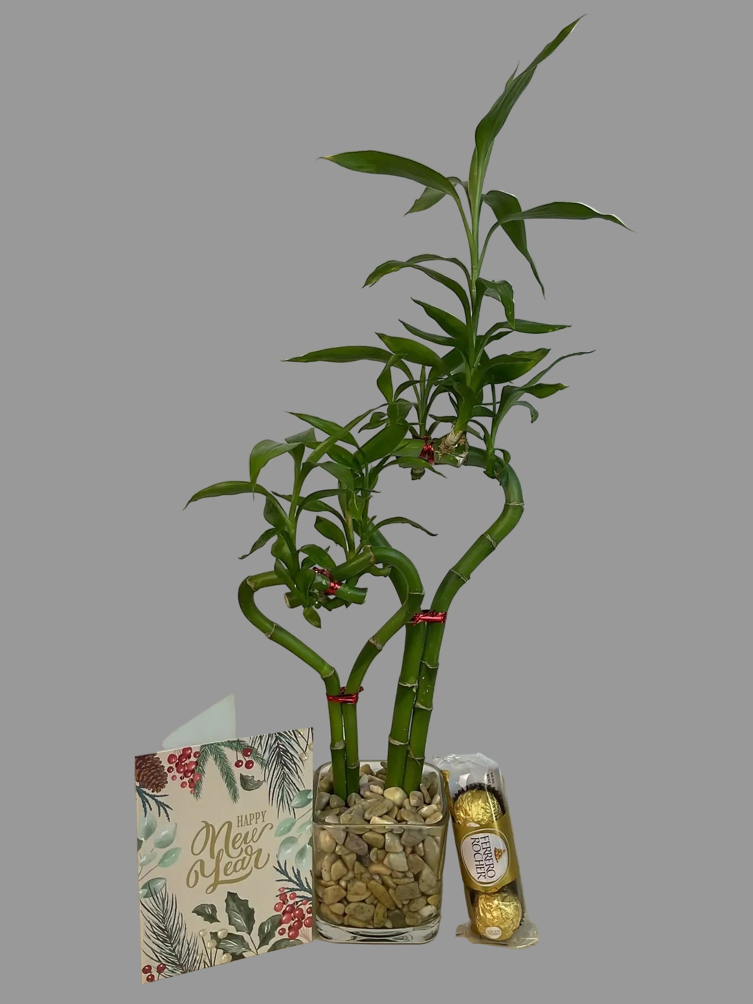 Double heart lucky bamboo with new Year card and 3 pcs Ferrero Rocher in 3.5 inch square vase 