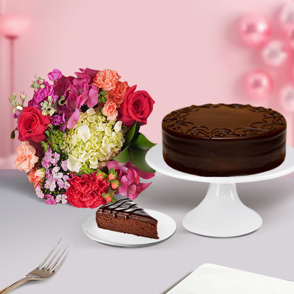 Gift combo with 6-inch chocolate cake and colorful mixed flowers bouquet featuring fresh seasonal blooms